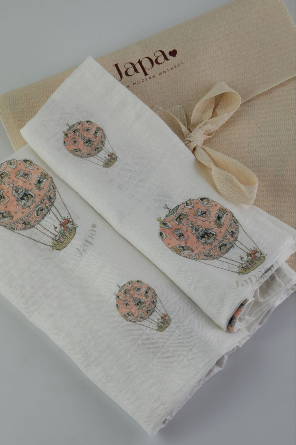 Rosè Skies Swaddle Blanket