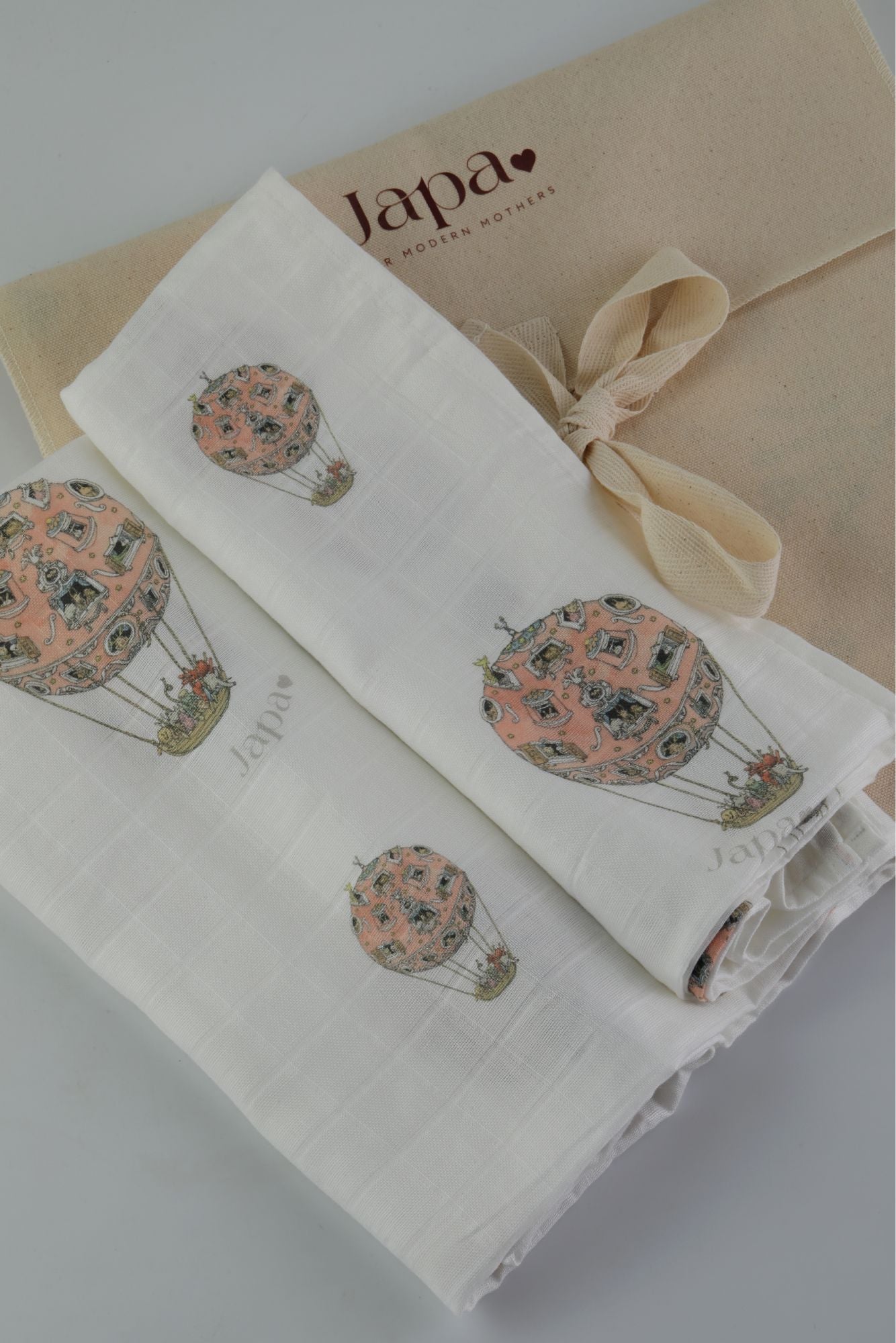Rosè Skies Swaddle Blanket