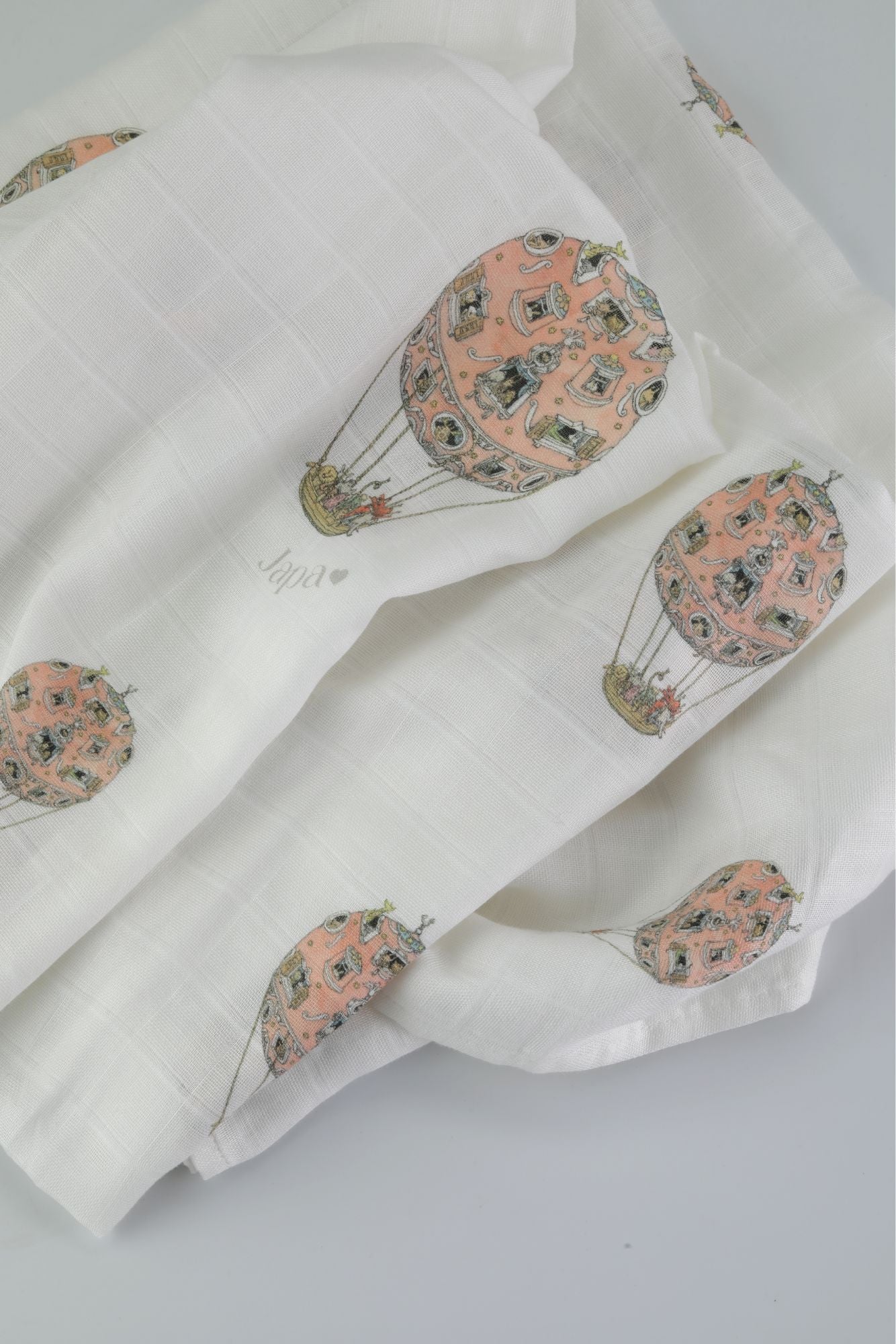 Rosè Skies Swaddle Blanket