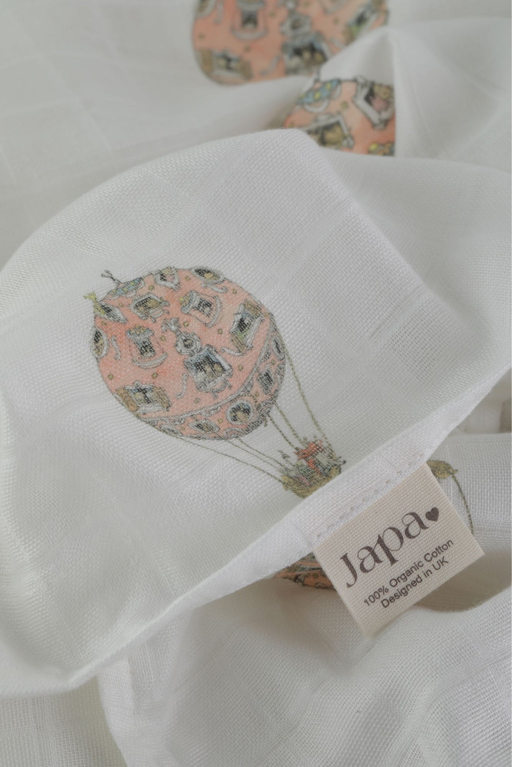 Rosè Skies Swaddle Blanket