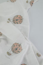 Rosè Skies Swaddle Blanket