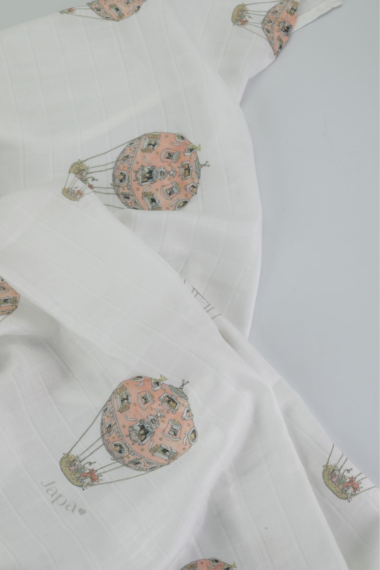Rosè Skies Swaddle Blanket