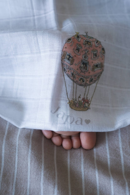 Rosè Skies Swaddle Blanket
