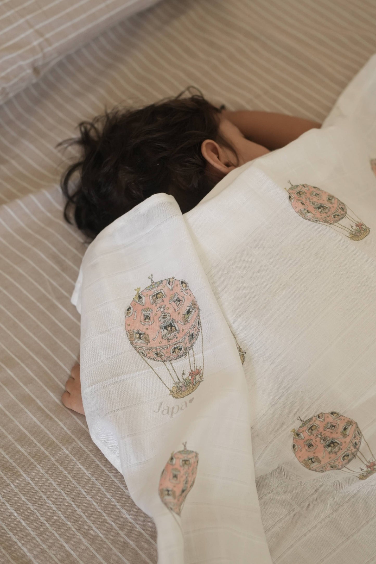 Rosè Skies Swaddle Blanket